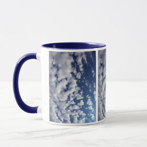 Puffy Clouds On Blue Sky Mug