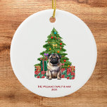 Pug Christmas Ornament<br><div class="desc">Celebrate the joy of the season with a touch of furry charm! This Custom Pug Christmas Ornament is the perfect way to honor your beloved four-legged friend this holiday season. Crafted with care, this ornament features a festive pug, complete with a Santa hat. What makes this ornament truly special is...</div>