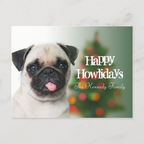 Pug dog against Christmas tree with bokeh Holiday Postcard