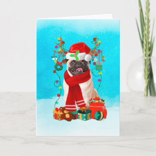 Pug in snow with Christmas gifts Card