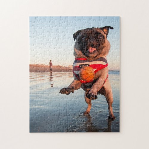 Pug Playing Ball on Beach Jigsaw Puzzle