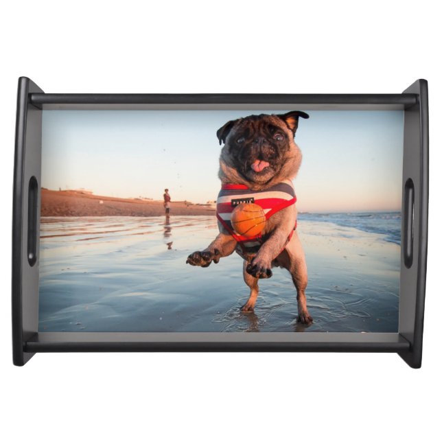 Pug Playing Ball on Beach Serving Tray (Front)