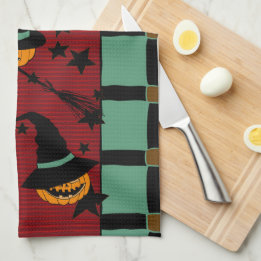 Pumpkin Jack-o’-Lanterns in Flight Tea Towel