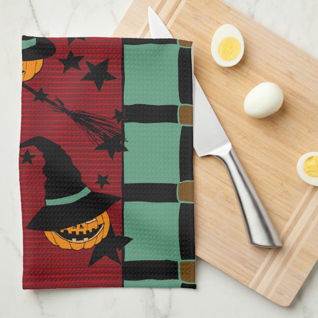 Pumpkin Jack-o’-Lanterns in Flight Tea Towel (Quarter Fold)