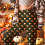 Pumpkin Pie Fall Thanksgiving Green Leggings<br><div class="desc">Celebrate the flavors of fall with these Pumpkin Pie Fall Thanksgiving Green Leggings. Featuring a charming pumpkin pie pattern on a festive green background, these leggings are perfect for adding a fun and cozy touch to your Thanksgiving attire. Soft, stretchy, and stylish, they are ideal for lounging, casual outings, or...</div>