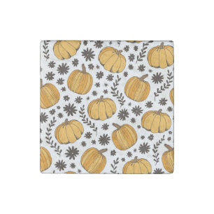Pumpkin sketches: hand-drawn seamless pattern. stone magnet