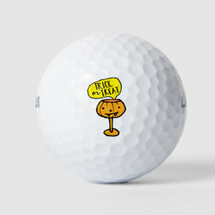 Pumpkin trick and treat golf balls