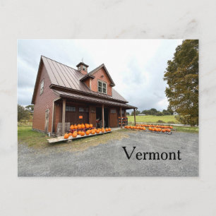 Pumpkins by a small farm building postcard