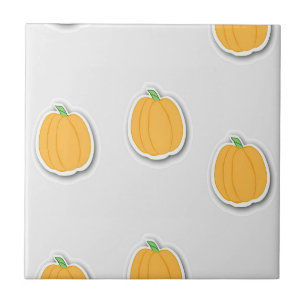 Pumpkins on  gray ceramic tile