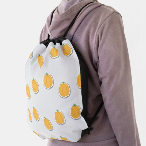 Pumpkins on gray drawstring bag