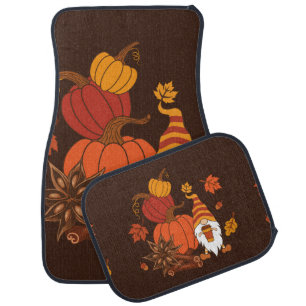 Pumpkins, star anise, cinnamon sticks, autumn leav car floor mat
