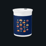 Pumpkins with Leaves Pitcher<br><div class="desc">The pattern with ripe and green pumpkins and leaves is drawn in watercolors and placed on a navy background. It's a cheerful print for your home.</div>