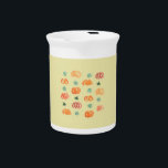 Pumpkins with Leaves Pitcher<br><div class="desc">The pattern with ripe and green pumpkins and leaves is drawn in watercolors and placed on a pale goldenrod background. It's a cheerful print for your home.</div>