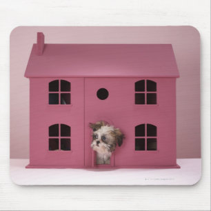 Puppy peering out of doll's house mouse pad