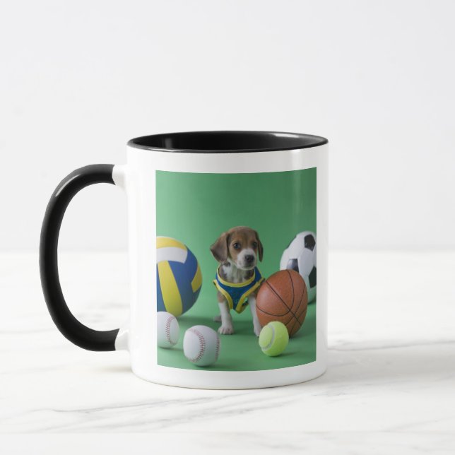 Puppy surrounded by sport balls mug (Left)