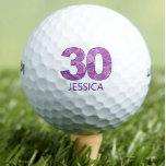 Purple 30th Birthday Golfer Gift 30 Years elegant Golf Balls<br><div class="desc">Purple 30th Birthday Golfer Gift 30 Years elegant Golf Balls. Celebrate a 30th birthday with style and elegance! This personalized golf ball features a "30" in a sophisticated purple paisley pattern, accompanied by a customizable name. Perfect for golf-loving women who appreciate a refined design, this unique keepsake is ideal as...</div>
