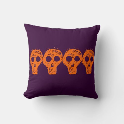 purple and orange skull Halloween pillow