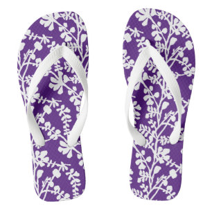 Purple And White Floral Repeating Pattern Flip Flops