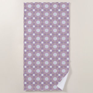 Purple and white geometric floral patterned beach towel