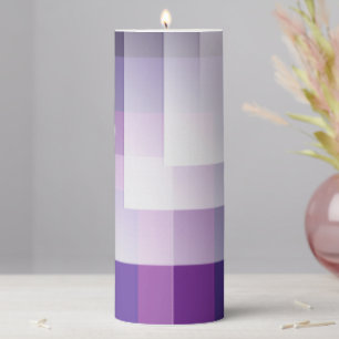 Purple and white pillar candle