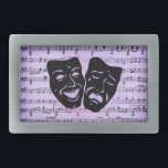 Purple Art Unites Theater Masks Belt Buckle<br><div class="desc">Artistic talent comes in many forms and when they unite it is spectacular. The Greek theater masks of comedy and tragedy lie atop a sheet of music.</div>