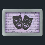 Purple Art Unites Theater Masks Belt Buckle<br><div class="desc">Artistic talent comes in many forms and when they unite it is spectacular. The Greek theater masks of comedy and tragedy lie atop a sheet of music.</div>