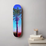 Purple Blue Palm Tree, Cool Retro Vintage Trendy Skateboard<br><div class="desc">Get ready to embrace the warm sunshine on your city streets whenever you use this wildly, colorful photo skateboard of a towering California palm tree with a vintage look, distressed purple, blue and red background. Makes a retro cool and fun statement every time you surf the pavement. Makes a great...</div>