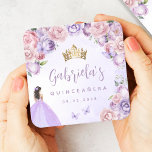 Purple Blush Floral Quinceañera Square Paper Coaster<br><div class="desc">These lovely quinceañera party coasters feature a border of lilac purple and blush pink roses on a purple watercolor background. A gold tiara, a dark-haired girl in a purple princess dress and small purple butterflies decorate the text. The name of the guest of honor appears in elegant purple handwriting script,...</div>