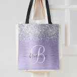 Purple Brushed Metal Silver Glitter Monogram Name Tote Bag<br><div class="desc">Easily personalize this trendy chic tote bag design featuring pretty silver sparkling glitter on a purple brushed metallic background.</div>