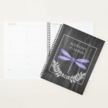 Purple Dragonfly Rustic Planner<br><div class="desc">Keep track of appointments and meetings with a Purple Dragonfly Rustic Personalized Planner.  Planner design features a vibrant dragonfly adorned with delicate foliage against a dark gray rustic wooden background.  Additional gift items available with this design as well as a variety of colors.</div>