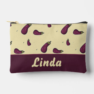 Purple eggplants on yellow accessory pouch