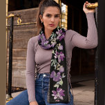 Purple floral black Chiffon Scarf<br><div class="desc">Long rectangle chiffon scarf with beautiful purple flowers on a dark black background with shades of green and a strip of little hearts on both sides of each floral pattern.</div>