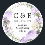 Purple Floral Monogrammed Wedding Thank You Classic Round Sticker<br><div class="desc">Purple roses and white flowers are nestled in buds and greenery to create a romantic wreath. Your couple's initials, wedding date and thank you statement are in the center. Perfect seal for your thank you notes or wedding favors. It is part of the Violette collection that contains many DIY templates...</div>