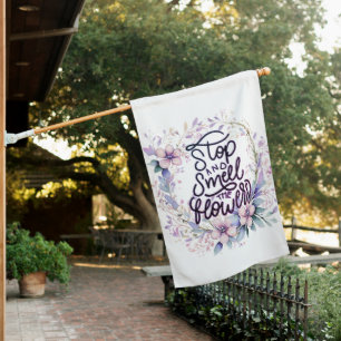Purple floral stop and smell the flowers house flag
