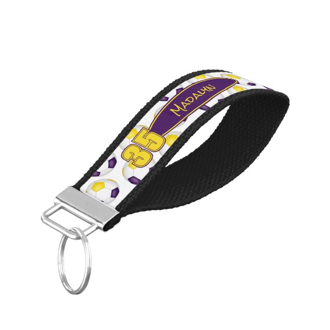 purple gold soccer balls pattern athlete name wrist keychain (Angled Down)