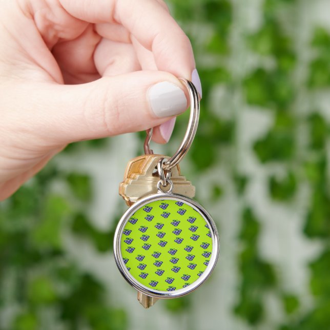 Purple grapes pattern on green keychain (Hand)