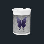 Purple Jeweled Butterfly Beverage Pitcher<br><div class="desc">Serve your hot or cold beverages with this unique Jeweled Butterfly Personalized Porcelain Pitcher. Pitcher design features a vibrant jeweled butterfly against an elegant vintage gray damask pattern. Additional gift items available with this design as well as a variety of colors.</div>