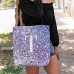 Purple Ombre Chunky Glitter Monogrammed Tote Bag<br><div class="desc">A modern bold single letter double layer monogram in white with a black drop shadow. The font size, color and style are customizable. The background is a faux lavender, purple and periwinkle gradient glitter with sparkly spots or blurry bokeh. Move or delete the tiny faux sparkle graphics. A nice gift...</div>