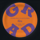 Purple on Orange Personalized Graduation Paper Plates<br><div class="desc">GRAD in bold purple lettering curves around the edges of these orange graduation party paper plates - available in 2 sizes. Congratulations above the name of your graduate and the Class of below. The perfect addition to your table decor for upcoming grad parties. **TIP: Click on CUSTOMIZE button; click on...</div>