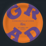 Purple on Orange Personalized Graduation Paper Plates<br><div class="desc">GRAD in bold purple lettering curves around the edges of these orange graduation party paper plates - available in 2 sizes. Congratulations above the name of your graduate and the Class of below. The perfect addition to your table decor for upcoming grad parties. **TIP: Click on CUSTOMIZE button; click on...</div>