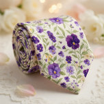 Purple Pansy Floral Neck Tie<br><div class="desc">This charming necktie features a beautiful vintage-style botanical pattern with vibrant purple pansies, smaller violet flowers, and delicate green leaves on a soft cream background. The design has a lovely hand-painted watercolor feel that brings a touch of nature and elegance to any outfit. Perfect for spring and summer weddings, garden...</div>