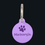 Purple Paw Print Pet ID Tag<br><div class="desc">This simply designed pet ID tag will help get your beloved pet back to you where they belong. By having an identification tag on your dog, anyone who finds them will be able to contact you immediately. If they are picked up by your local animal control or humane society, the...</div>