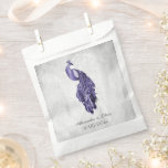 Purple Peacock Wedding Favor Bag<br><div class="desc">Pass out wedding favors for your guests with a set of Purple Peacock Wedding Favor Bag.  Bag design features an elegant peacock against delicate foliage and grunge background.   Personalize with the groom and bride's names along with the wedding date. Additional wedding stationery available with this design as well.</div>