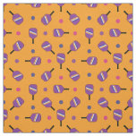 Purple Pickleball paddles on orange Fabric