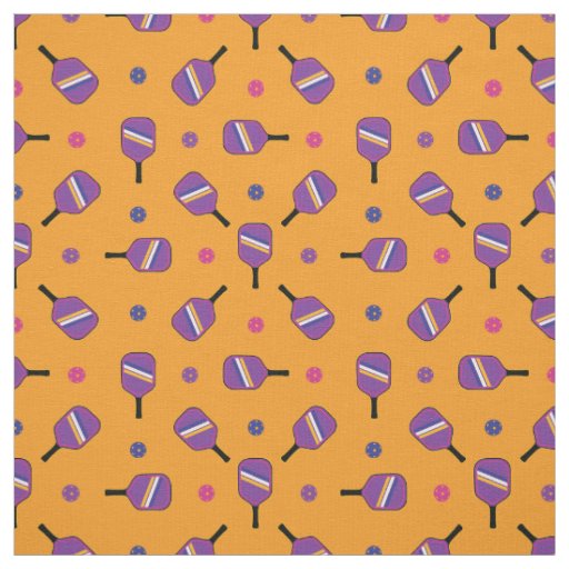 Purple Pickleball paddles on orange Fabric
