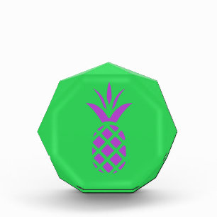 Purple pine apple in green. award
