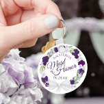 Purple & Plum Floral Wreath Maid of Honor Wedding Keychain<br><div class="desc">This keychain is designed as a thank you gift for the Maid of Honor at your wedding. The elegant boho chic design a rustic hand painted watercolor design with a wreath of roses and flowers in shades of purple, violet, plum, and lavender. The text is written in elegant script letters,...</div>