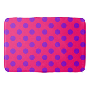 Purple polka dots on cerise bathroom mat