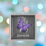 Purple Rustic Butterfly Personalized Locket Necklace<br><div class="desc">Create a unique gift for her with a Purple Rustic Butterfly Personalized Silver Plated Necklace. Necklace design features a butterfly against a white leaf vine and dark gray wooden background with a place to personalize with your name. Additional items available with this design as well. Please contact me directly for...</div>