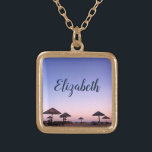 Purple Sunset California Beach Photo Monogram Name Gold Plated Necklace<br><div class="desc">A purple blue and pink sunset on a Southern California beach with thatched palapas oozes relaxation and reflection. Travel back to your vacation beach days whenever you wear this stunning, beautiful photography personalized name charm necklace. This necklace comes in small, medium and large sizes, as well as both square and...</div>